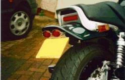 © Short tail rear mudguard with twin oval lights. © (1200)